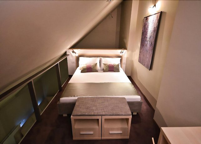 Imagen de la habitación del Hotel Art Loft. Foto 6
