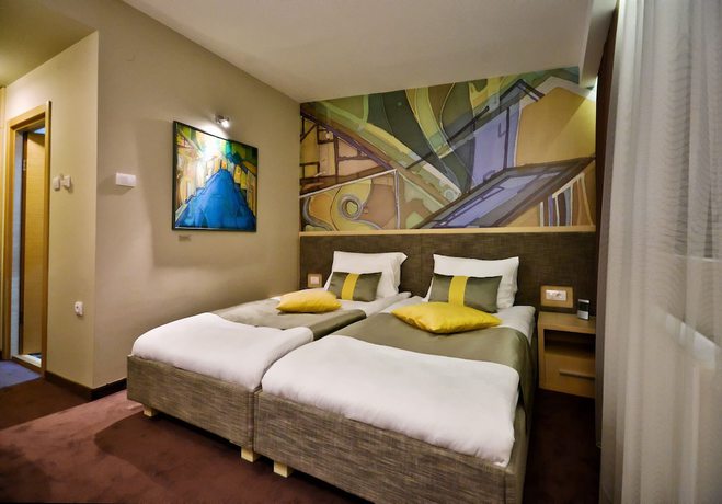 Imagen de la habitación del Hotel Art Loft. Foto 12