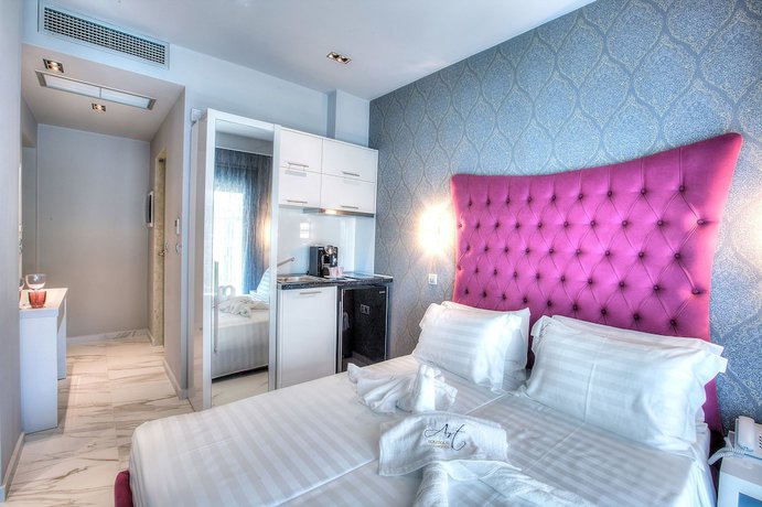 Imagen de la habitación del Hotel Art Luxury Suites. Foto 7