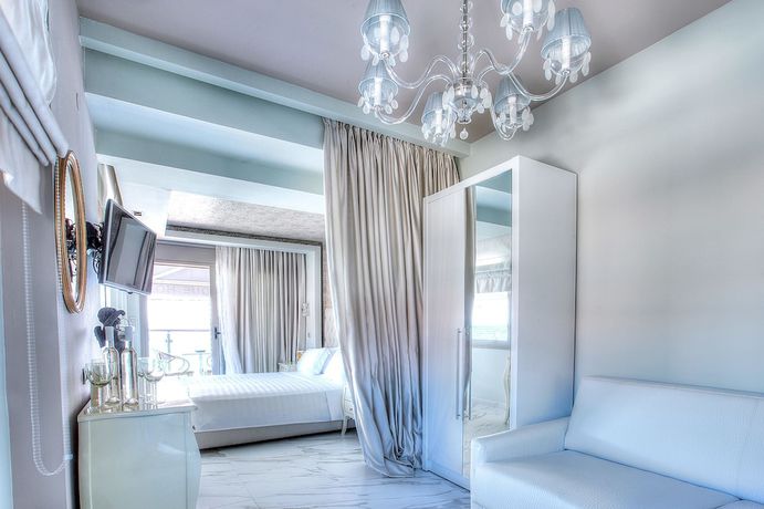 Imagen de la habitación del Hotel Art Luxury Suites. Foto 10