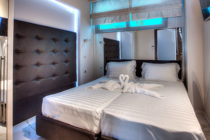 Imagen de la habitación del Hotel Art Luxury Suites. Foto 15