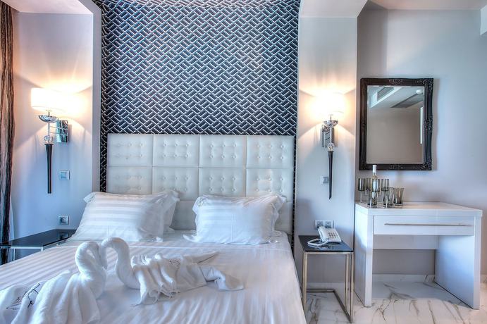 Imagen de la habitación del Hotel Art Luxury Suites. Foto 16