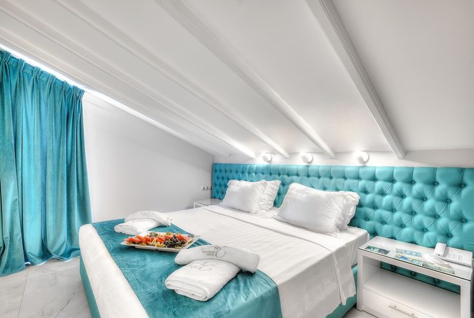 Imagen de la habitación del Hotel Art Luxury Suites. Foto 17