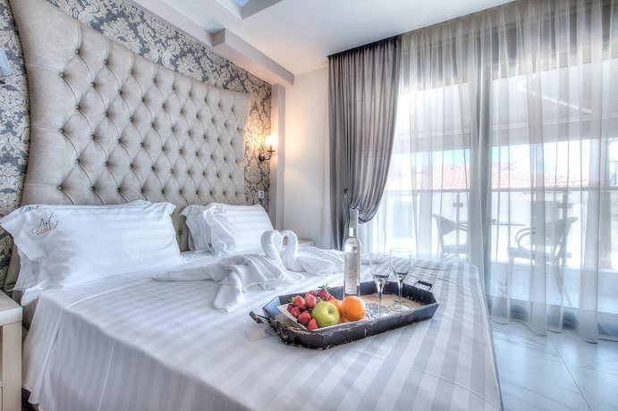 Imagen de la habitación del Hotel Art Luxury Suites. Foto 18