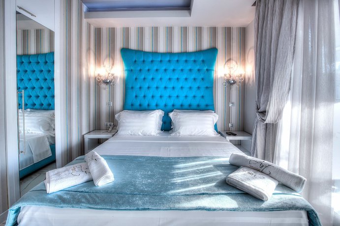 Imagen de la habitación del Hotel Art Luxury Suites. Foto 19
