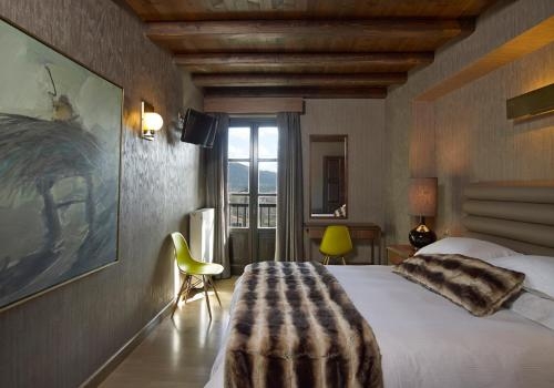 Imagen de la habitación del Hotel Art Mainalon. Foto 7