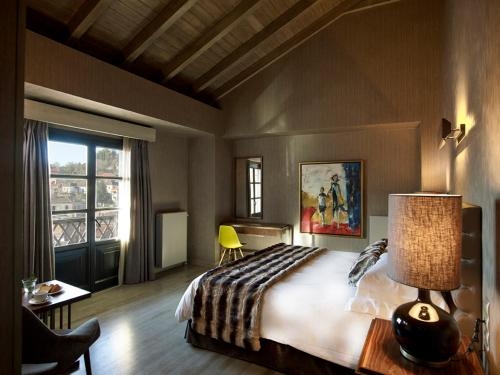 Imagen de la habitación del Hotel Art Mainalon. Foto 8