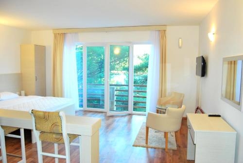 Imagen de la habitación del Hotel Art Media. Foto 6