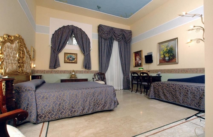 Imagen de la habitación del Hotel Art Resort Galleria Umberto. Foto 4