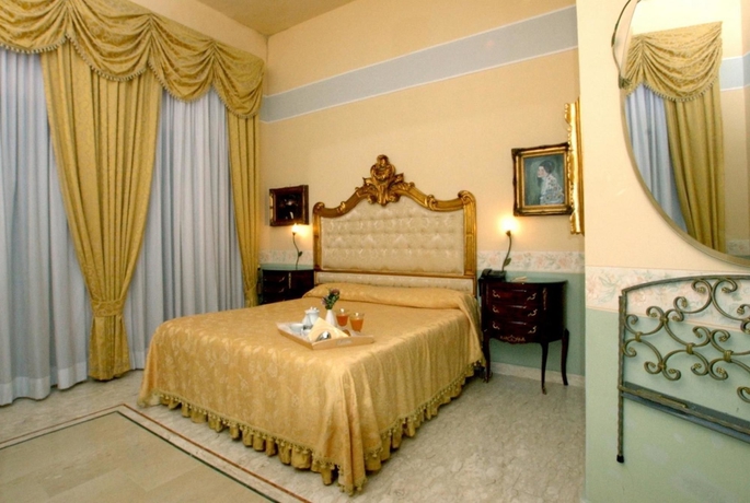 Imagen de la habitación del Hotel Art Resort Galleria Umberto. Foto 5