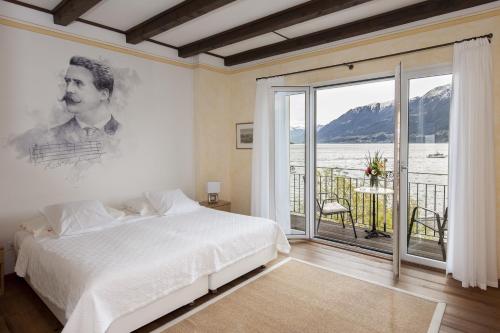 Imagen de la habitación del Hotel Art Ristorante Posta Al Lago. Foto 7