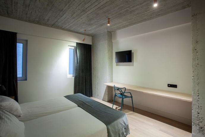 Imagen de la habitación del Hotel Art Suites Korai. Foto 4