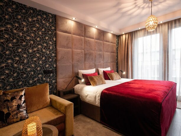 Imagen de la habitación del Hotel Art Suites Luxury. Foto 11