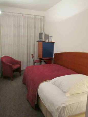 Imagen de la habitación del Hotel Art Tartini. Foto 9