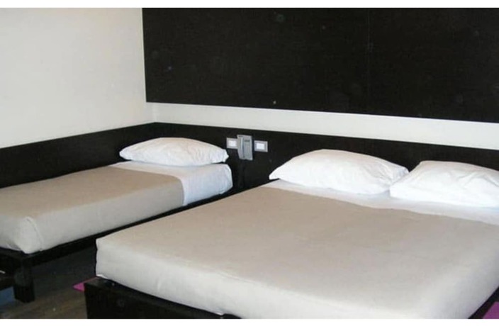 Imagen de la habitación del Hotel Art Udine. Foto 13