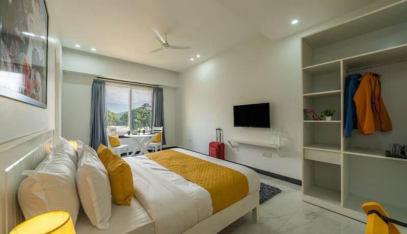 Imagen de la habitación del Hotel ArtBuzz Dehradun. Foto 15