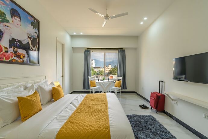Imagen de la habitación del Hotel ArtBuzz Dehradun. Foto 19