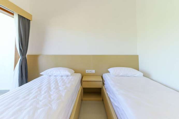 Imagen de la habitación del Hotel Arta Loka In Villa. Foto 6