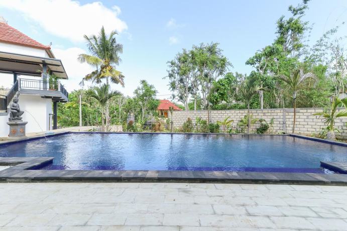 Imagen de la piscina del Hotel Arta Loka In Villa. Foto 19