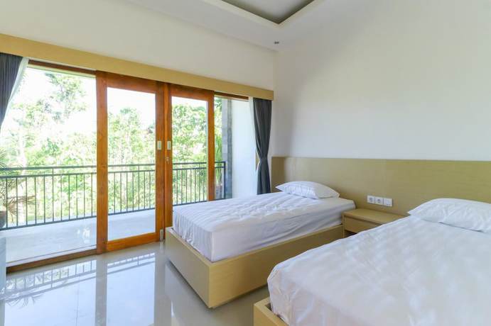 Imagen de la habitación del Hotel Arta Loka In Villa. Foto 13