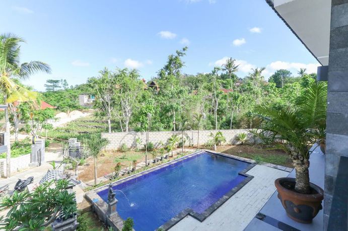 Imagen de la piscina del Hotel Arta Loka In Villa. Foto 20