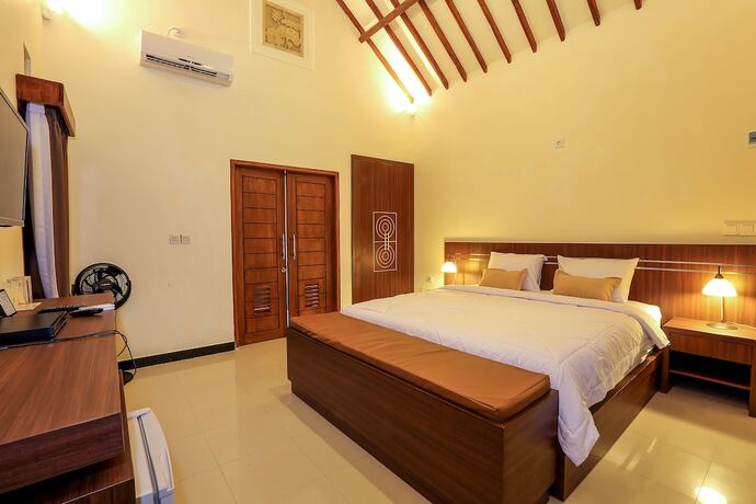 Imagen de la habitación del Hotel Artati Lombok Bungalows and Restaurant. Foto 17