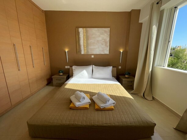 Imagen de la habitación del Hotel Artdeco Luxury Suites. Foto 17