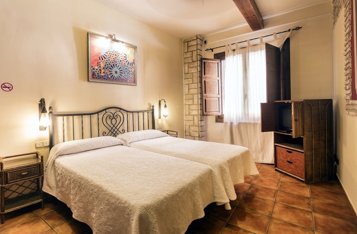 Imagen de la habitación del Hotel Arte Vida Suites y Spa. Foto 8