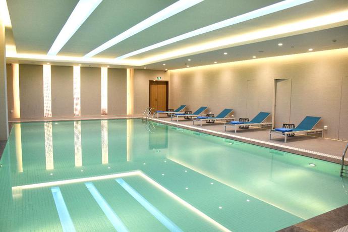 Imagen de la piscina del Hotel Artels Collection Lingang Shanghai. Foto 19