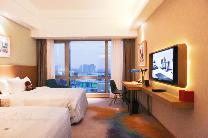 Imagen de la habitación del Hotel Artels Collection Lingang Shanghai. Foto 8