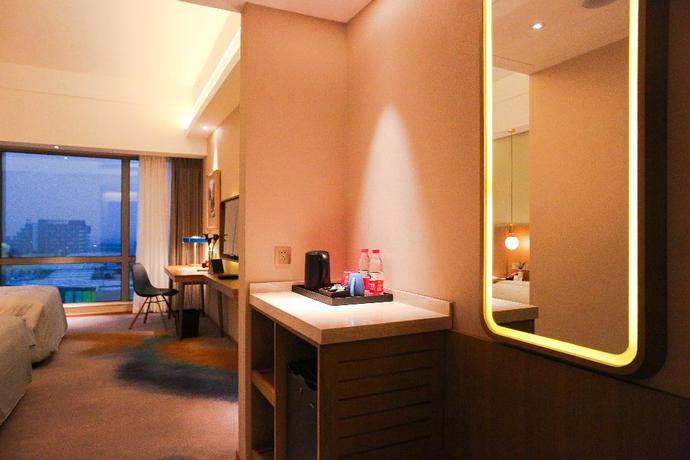 Imagen de la habitación del Hotel Artels Collection Lingang Shanghai. Foto 9