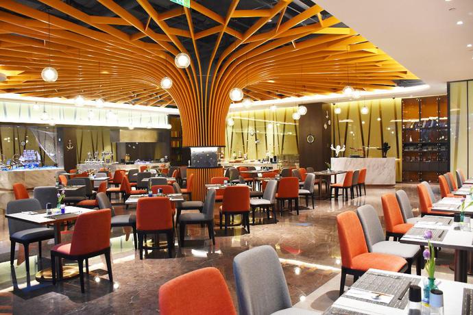 Imagen del bar/restaurante del Hotel Artels Collection Lingang Shanghai. Foto 3