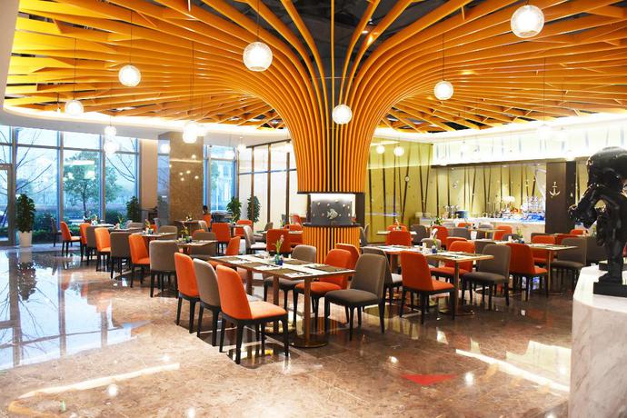 Imagen del bar/restaurante del Hotel Artels Collection Lingang Shanghai. Foto 4