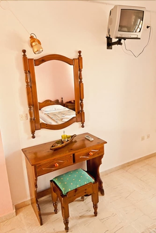 Imagen de la habitación del Hotel Artemis Village. Foto 6