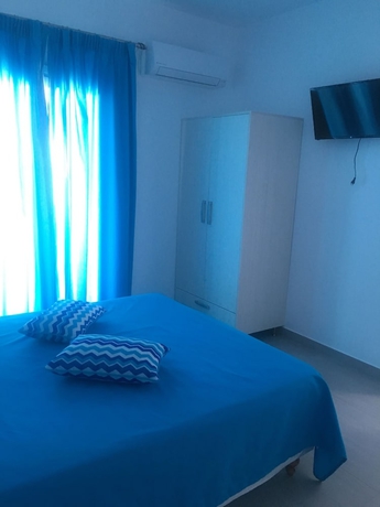 Imagen de la habitación del Hotel Artemis Village. Foto 15