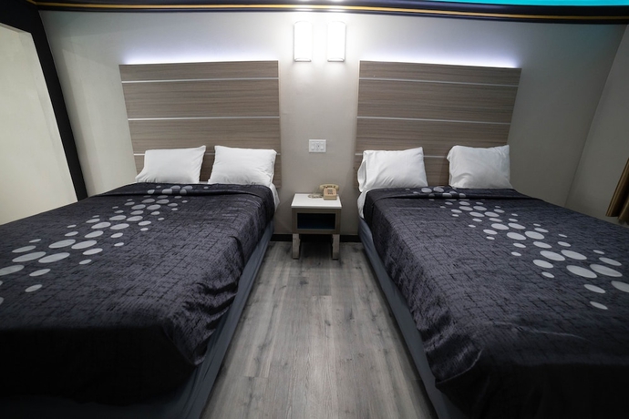 Imagen de la habitación del Hotel Artesia Motor Inn. Foto 11