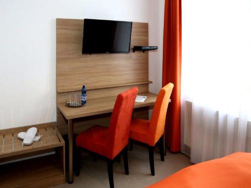 Imagen de la habitación del Hotel Arthotel. Foto 19