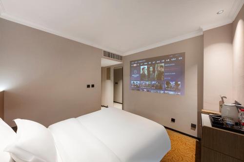 Imagen de la habitación del Hotel Arthur International - Provincial Science and Technology Museum Xianghu Branch. Foto 19