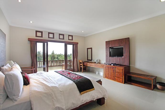 Imagen de la habitación del Hotel Artini Bisma Ubud. Foto 16