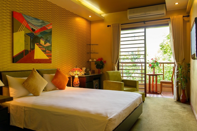 Imagen de la habitación del Hotel Artisan Boutique. Foto 10