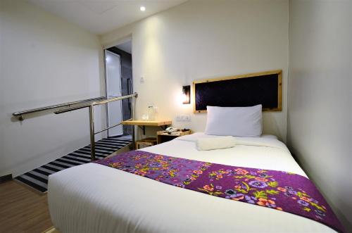 Imagen de la habitación del Hotel Artisan Eco. Foto 6