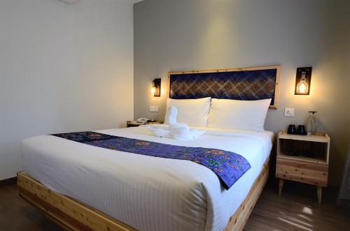 Imagen de la habitación del Hotel Artisan Eco. Foto 7