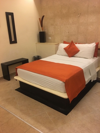 Imagen de la habitación del Hotel Artisan Family Hotels and Resorts Playa Esmeralda. Foto 10