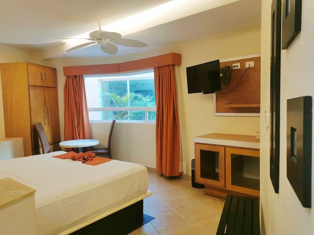 Imagen de la habitación del Hotel Artisan Family Hotels and Resorts Playa Esmeralda. Foto 11