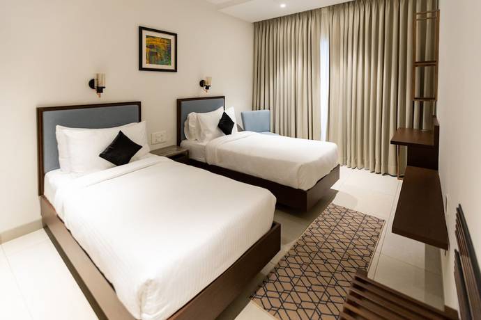 Imagen de la habitación del Hotel Artistry Suites. Foto 10