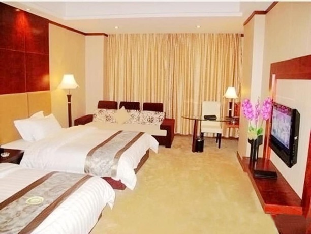 Imagen del bar/restaurante del Hotel Artland Peninsula Hotel. Foto 3