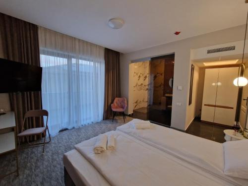 Imagen de la habitación del Hotel Art\'s Luxury Boutique. Foto 19