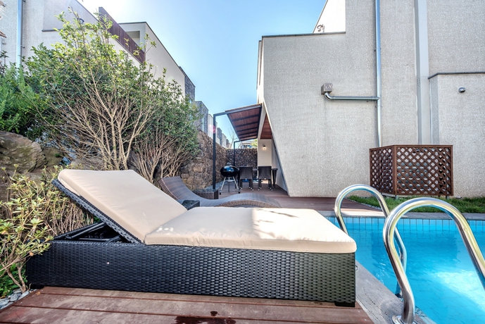 Imagen de la habitación del Hotel Arts Spa and Poolvilla. Foto 5