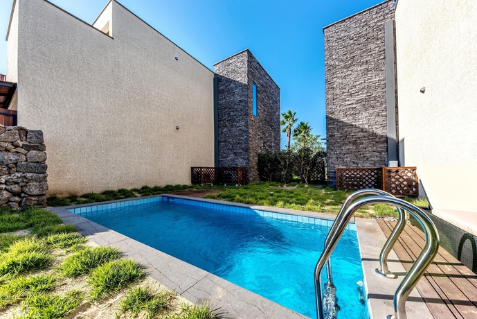 Imagen de la habitación del Hotel Arts Spa and Poolvilla. Foto 8