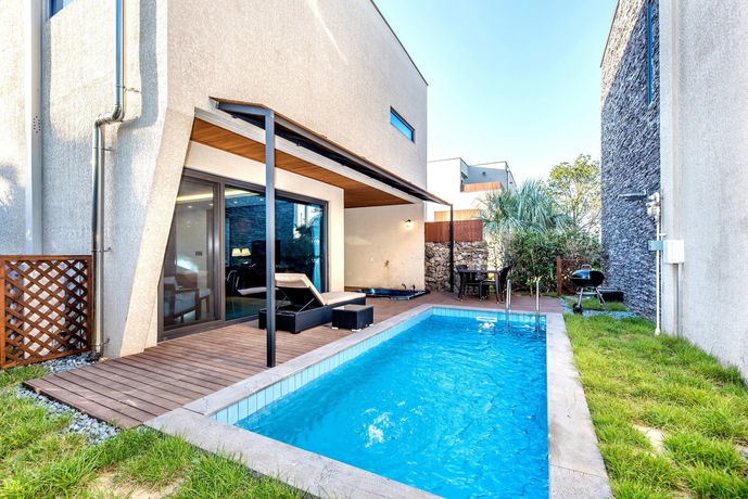 Imagen de la habitación del Hotel Arts Spa and Poolvilla. Foto 10